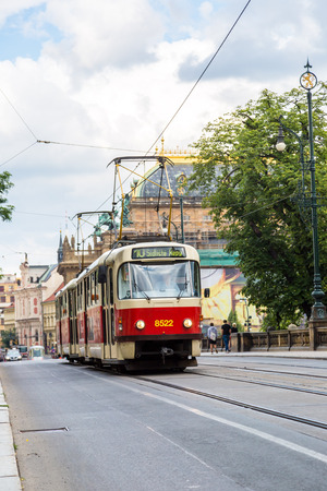 PRAGUE CZECH REPUBLIC -  JULY 21: Tram at old street in Prague, Czech Republic on July 21, 2014. Prague historical Center, including most of the city major sites, became a UNESCO-listed site in 1992.のeditorial素材