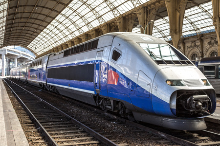 Passenger train stands at Nice train station in a summer day in Nice, Franceのeditorial素材
