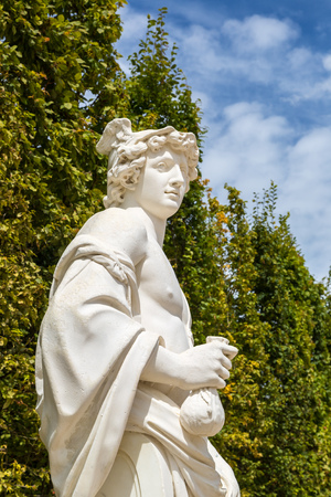 Statue in the park of Versailles palace in a summer day in Franceのeditorial素材