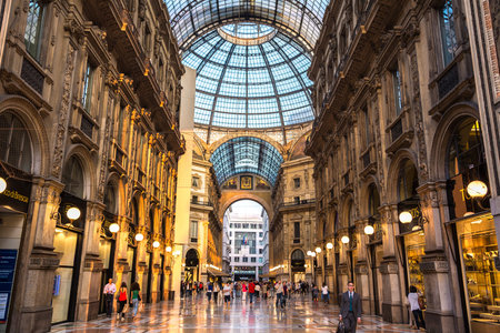 MILAN, ITALY - JULY 12, 2015: Famous Galleria Vittorio Emanuele II in a beautiful summer day in Milan on July 12, 2014 in Milan, Italyのeditorial素材