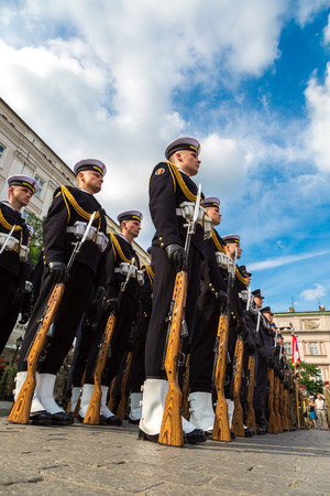 KRAKOW, POLAND - JULY 26: Polish soldiers in a historical  part of Krakow, Poland on July 26, 2014. Krakow is one of the oldest cities in Poland.のeditorial素材