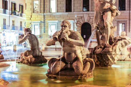 Moor Fountain in Navona Square in a summer night in Rome, Italyの写真素材