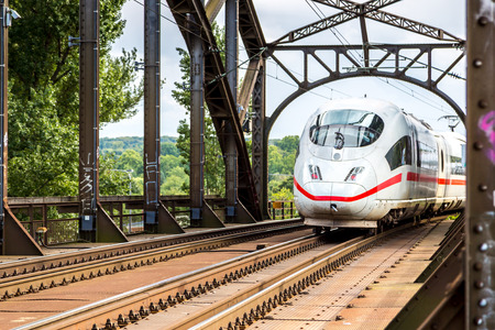 Electric InterCity Express in Frankfurt, Germany in a summer dayのeditorial素材