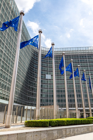 European flags in front of  headquarters of European commission in Brussels in summer dayのeditorial素材