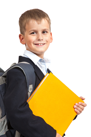 Boy holding books isolated on a white backgroundの写真素材