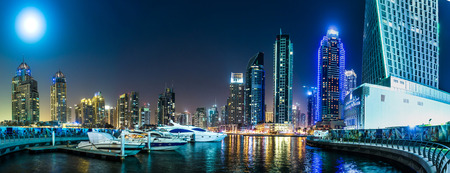 DUBAI, UAE - NOVEMBER 13: Dubai downtown night scene with city lights, luxury new high tech town in middle East. Dubai Marina cityscape,  on November 13, 2012 in Dubai, UAE.のeditorial素材