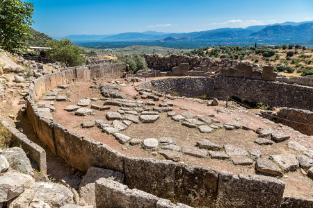 Tomb of the Kings and ruins of ancient city Mycenae, Greece in a summer dayの写真素材