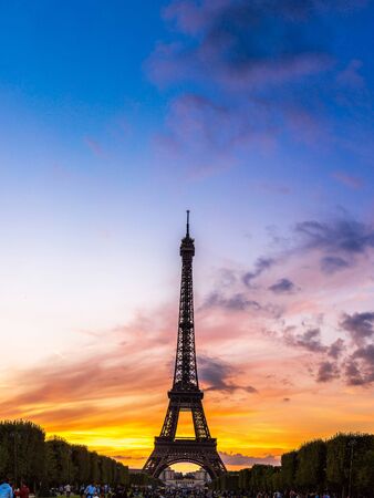 Eiffel Tower at sunset is the most visited monument in France and the most famous symbol of Parisの写真素材