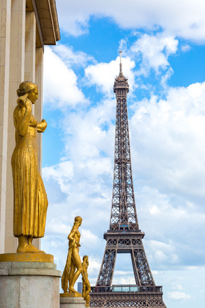 Sculptures on Trocadero and Eiffel Tower in Paris in summer dayの写真素材