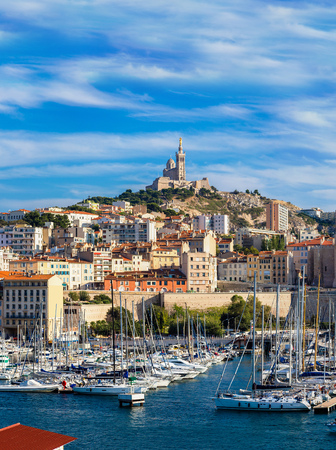 Aerial panoramic view on basilica of Notre Dame de la Garde and old port in Marseille, France Aerial panoramic view on basilica of Notre Dame de la Garde and old port in Marseille, France