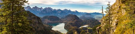 Alps and lakes in a summer day in Germany. Taken from the hill next to  Neuschwanstein castleのeditorial素材