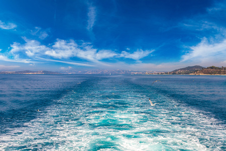 Boat trace in the sea in a summer dayの写真素材
