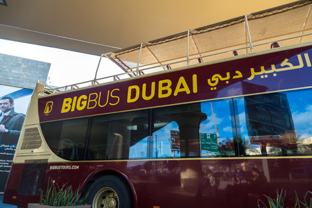 DUBAI, UAE - NOVEMBER 24 - Open-top bus tour "BIG Bus" in Dubai in a summer day, UAE on November 24, 2015のeditorial素材