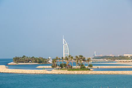 DUBAI, UAE - NOVEMBER 14: Burj Al Arab hotel and Jumeirah Beach Hotel in Dubai, United Arab Emirates, November 14, 2015のeditorial素材