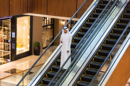 DUBAI, UAE - DECEMBER 5: Shoppers in Dubai Mall, UAE. December 5, 2015 in Dubai, United Arab...