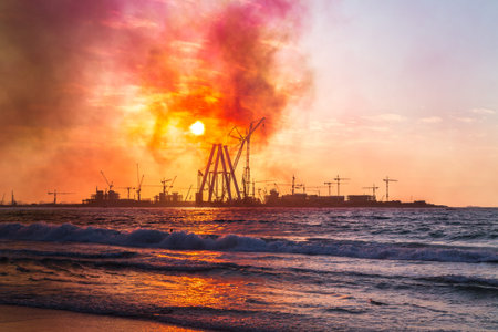 Construction site  in Dubai at the sea sunset