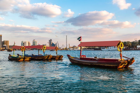 Old traditional boats on the bay Creek in Dubai, UAE