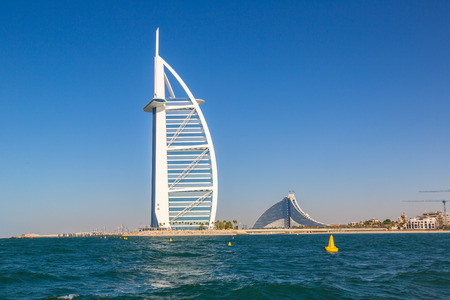 DUBAI, UAE - NOVEMBER 14: Burj Al Arab hotel and Jumeirah Beach Hotel in Dubai, United Arab Emirates, November 14, 2015のeditorial素材