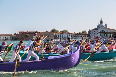 VENICE, Italy, JULY 12, 2014: Boat race in a summer day in Venice, Italyのeditorial素材