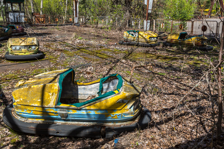 Abandoned amusement park in Pripyat, Chernobyl region, Ukraine in a summer dayの写真素材