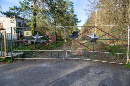 Military gate in Chernobyl, Ukraine in a summer day