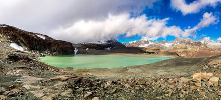 Alps mountain landscape and mountain lake in a beautiful day in Switzerlandの写真素材