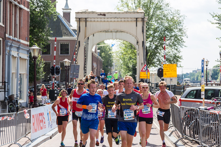 AMSTERDAM, THE NETHERLANDS - JUNE 16, 2016: The Amsterdam Marathon in Amsterdam in a beautiful summer day, The Netherlands on June 16, 2016のeditorial素材