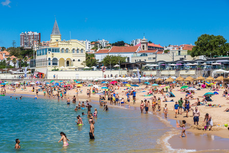 ESTORIL, PORTUGAL - JUNE 21, 2016: Public beach in Estoril in a beautiful summer day, Portugal on June 21, 2016のeditorial素材