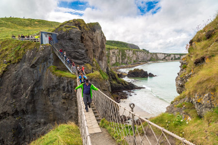 NORTHERN IRELAND, UNITED KINGDOM - JUNE 14, 2016: Carrick-A-Rede rope bridge, Northern Ireland, United Kingdom on June 14, 2016のeditorial素材