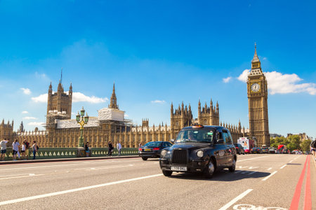 LONDON, UNITED KINGDOM - JUNE 14, 2016: Big Ben, Westminster Bridge and red double decker bus in...