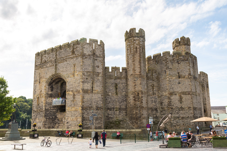 CAERNARFON, WALES - JUNE 15, 2016: Caernarfon Castle in Wales in a beautiful summer day, United Kingdom on June 15, 2016のeditorial素材
