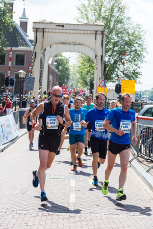 AMSTERDAM, THE NETHERLANDS - JUNE 16, 2016: The Amsterdam Marathon in Amsterdam in a beautiful summer day, The Netherlands on June 16, 2016のeditorial素材