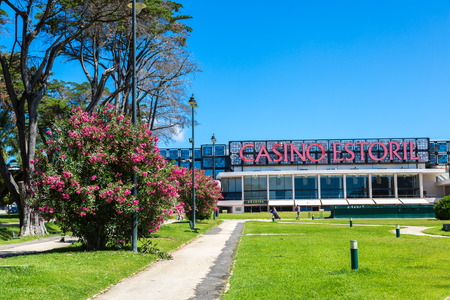 ESTORIL, PORTUGAL - JUNE 21, 2016: Facade of the Casino Estoril in Estoril city in a beautiful summer day, Portugal on June 21, 2016のeditorial素材