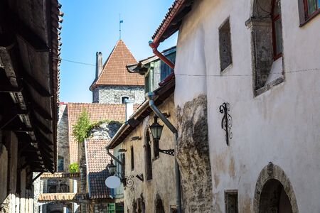 St Catherine's passage - historical cobbled street in old town of Tallinn in a beautiful summer day, Estoniaの写真素材
