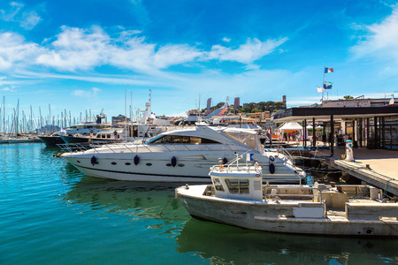 Yachts anchored in port in Cannes in a beautiful summer day, Franceの写真素材