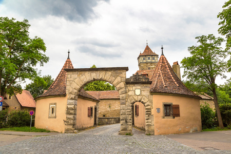 Gate to the old city Rothenburg in a beautiful summer day, Germanyのeditorial素材
