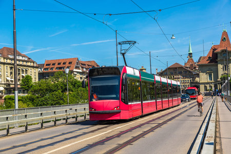Modern city tram in Bern in a beautiful summer day, Switzerland