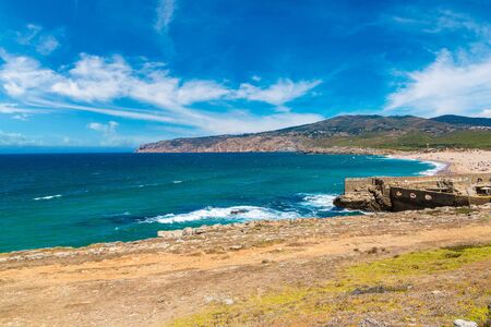 Cliffs and rocks on the Atlantic ocean coast in Sintra in a beautiful summer day, Portugalの写真素材