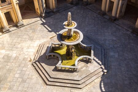 Central square of the inside medieval Templar castle in Tomar in a beautiful summer day, Portugalのeditorial素材