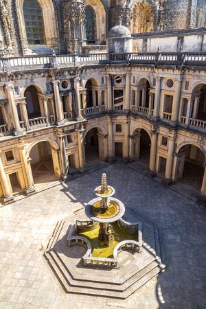 Central square of the inside medieval Templar castle in Tomar in a beautiful summer day, Portugalのeditorial素材