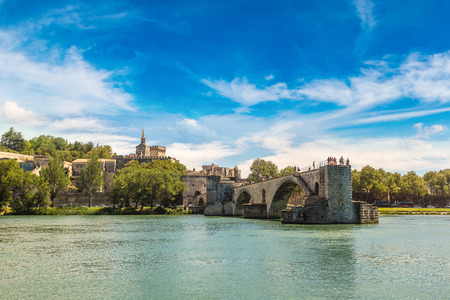 Saint Benezet bridge and Palace of the Popes in Avignon in a beautiful summer day, Franceのeditorial素材
