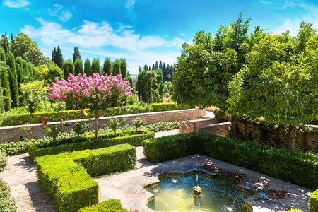Gardens and fountains in Alhambra palace in Granada in a beautiful summer day, Spainのeditorial素材