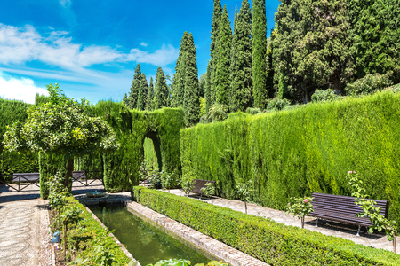 Gardens and fountains in Alhambra palace in Granada in a beautiful summer day, Spainのeditorial素材