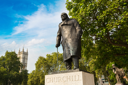Statue of Winston Churchill in Parliament Square in a beautiful summer day, London, England, United Kingdomの写真素材