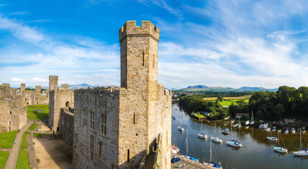 Caernarfon Castle in Wales in a beautiful summer day, United Kingdomのeditorial素材