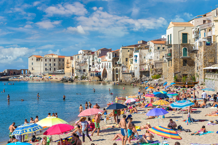 Sandy beach in Cefalu in Sicily, Italy in a beautiful summer dayのeditorial素材