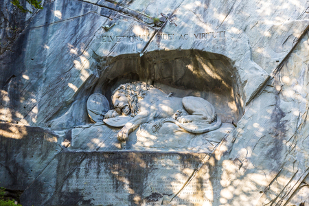 Dying lion monument in Lucerne in a beautiful summer day, Switzerlandの写真素材