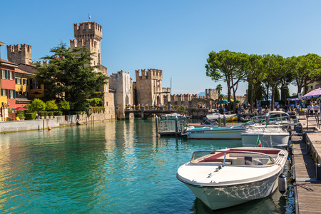 SIRMIONE, ITALY - JUNE 16, 2016: Scaliger castle in Sirmione on lake Garda in a beautiful summer day, Italy on June 16, 2016のeditorial素材