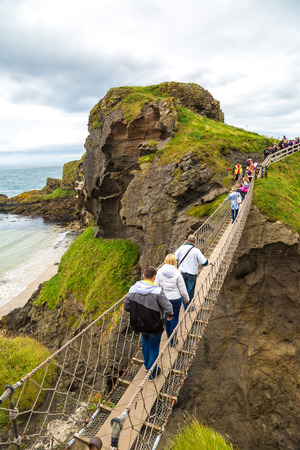 NORTHERN IRELAND, UNITED KINGDOM - JUNE 14, 2016: Carrick-A-Rede rope bridge, Northern Ireland, United Kingdom on June 14, 2016のeditorial素材