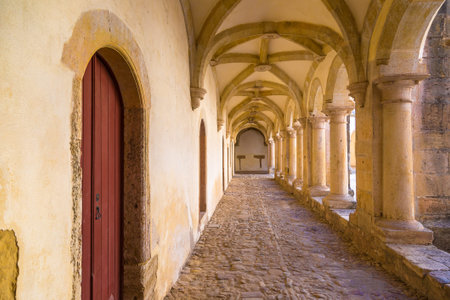 Central square of the inside medieval Templar castle in Tomar in a beautiful summer day, Portugal